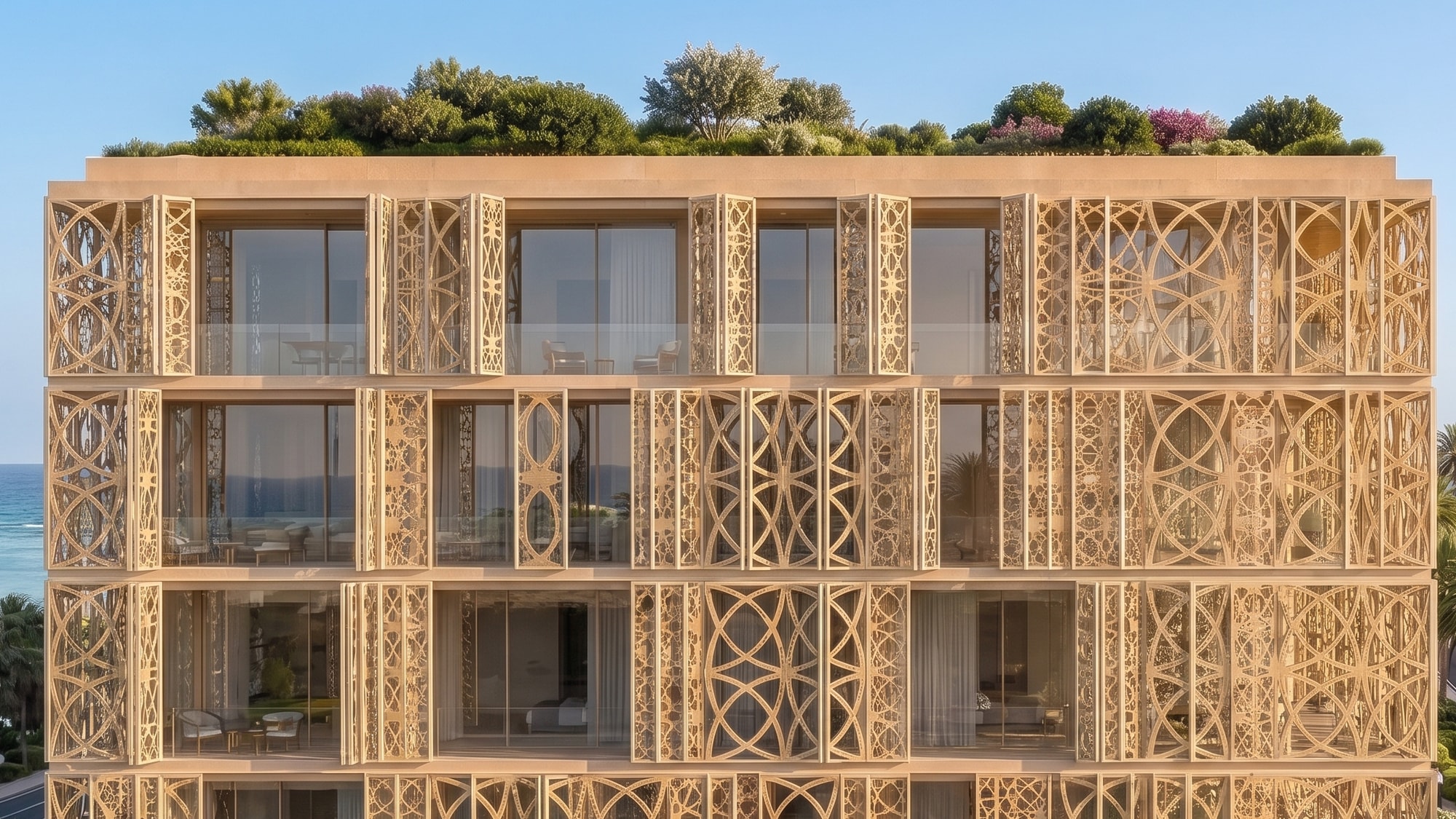 The carved facade of a residence building with rooftop planting
